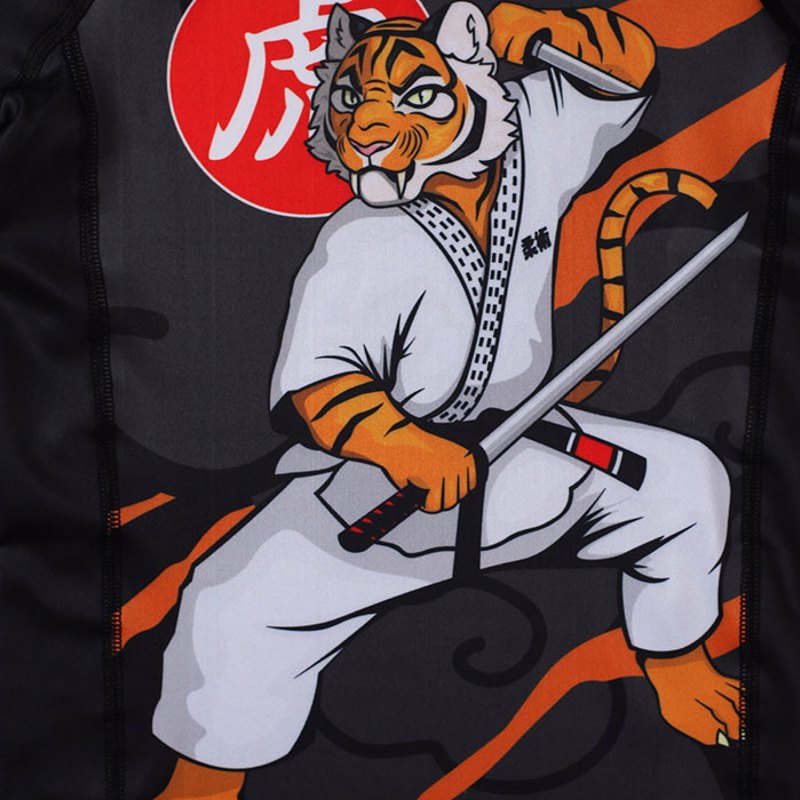 ../../aimeos/1.d/files/groundgame-rashguard-kids-tora-black264035.jpeg